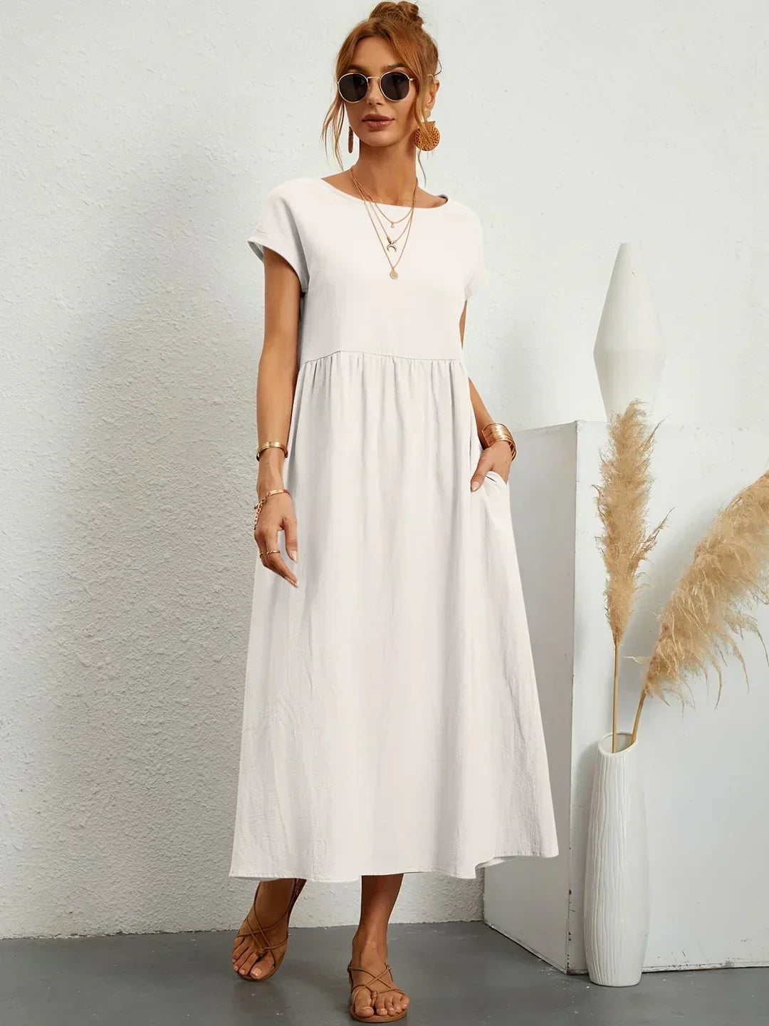 Gabrielle – tekoča midi obleka z brezčasno eleganco